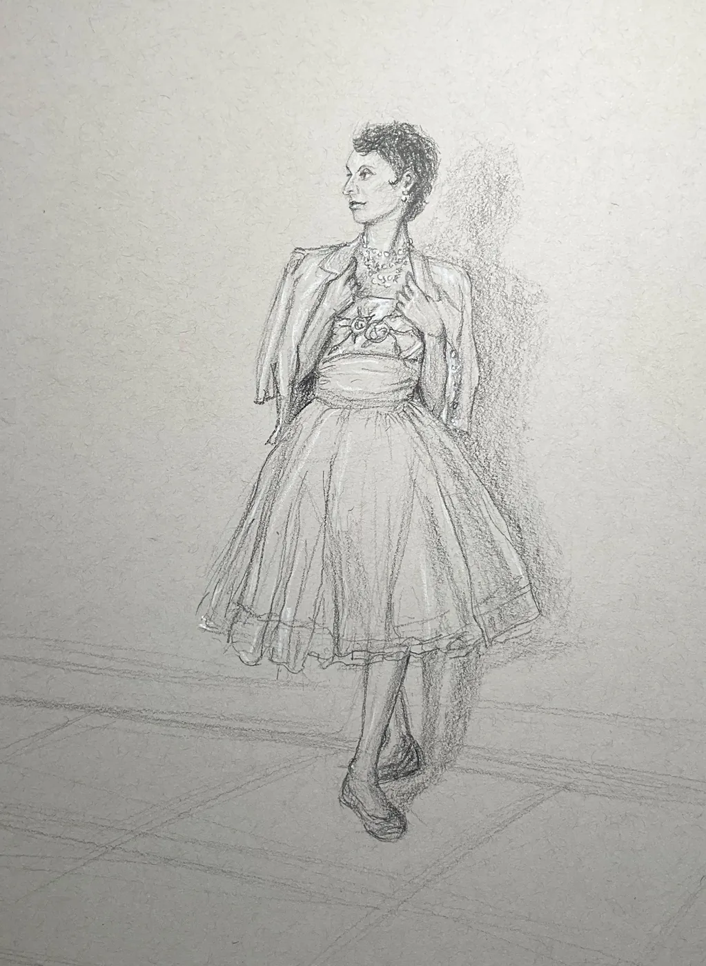 Graphite drawing of a standing woman in a full skirt and cropped jacket, looking over her shoulder, by Kirsten Griffiths, before the program