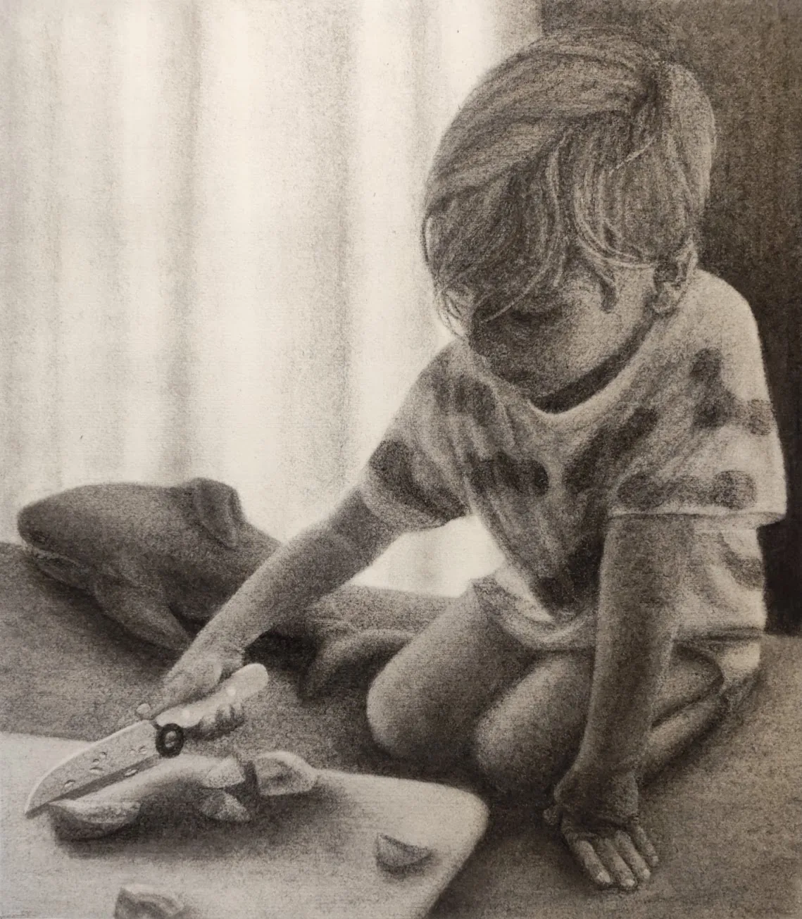 Charcoal drawing of a child kneeling at a low table cutting fruit, by Kris Verjans