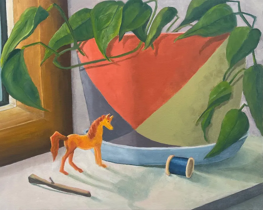 Oil painting of a windowsill still life: a striped red and blue bowl trailing a pothos vine, a small orange toy horse, and a wooden spool.